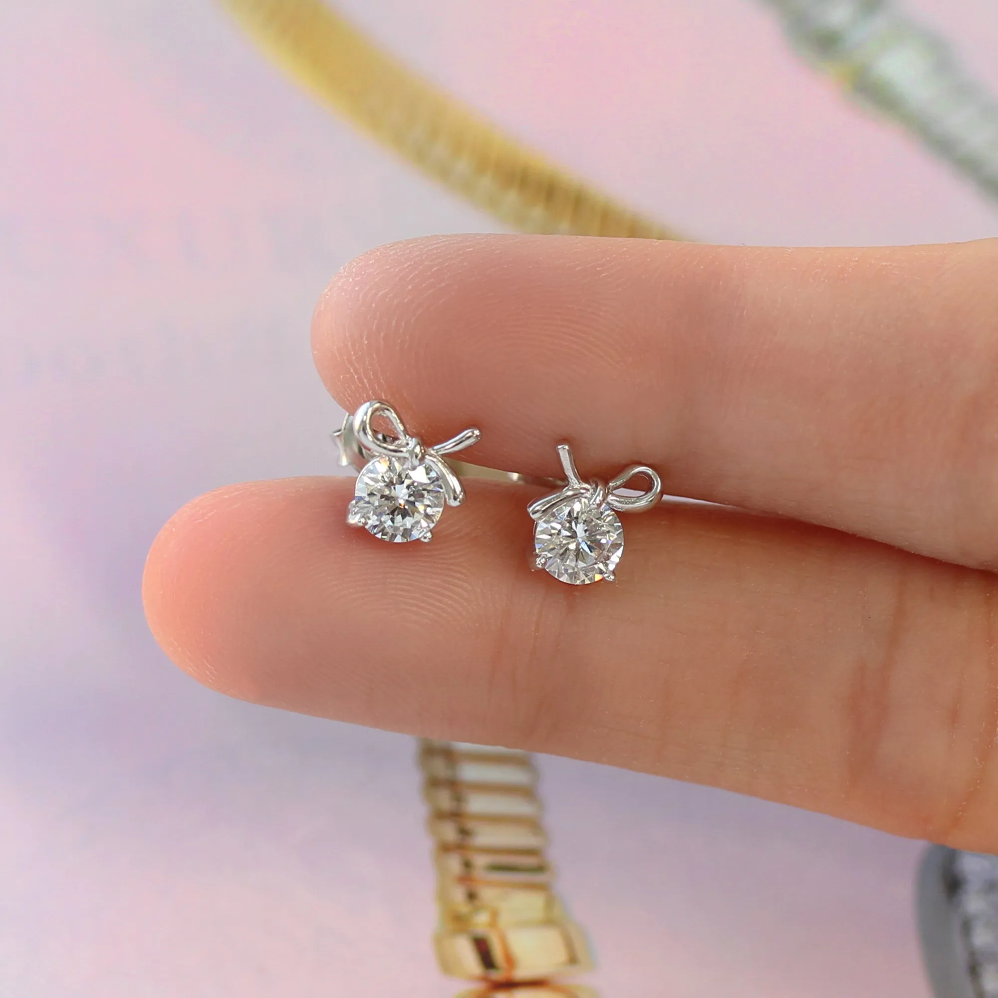 1 CTW Bow Earrings, Platinum Plated Sterling Silver