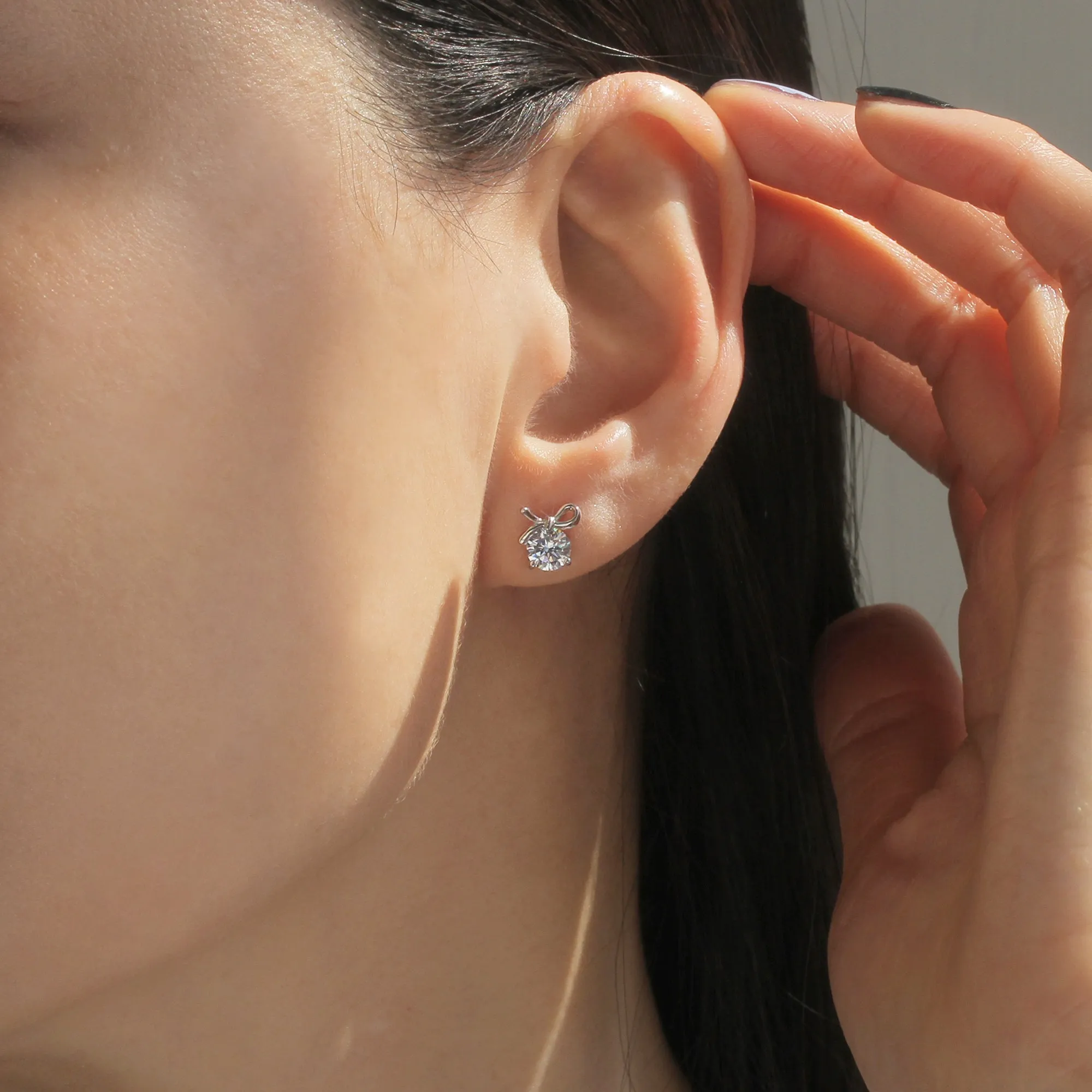 1 CTW Bow Earrings, Platinum Plated Sterling Silver