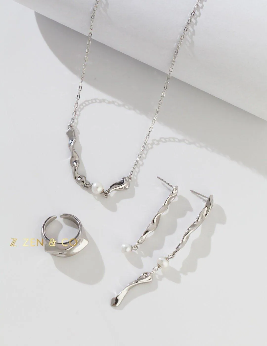 ALLEGRA Asymmetric long dangle earrings