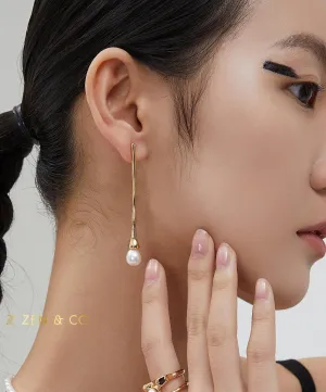 CELINE Asymmetric dangle earrings
