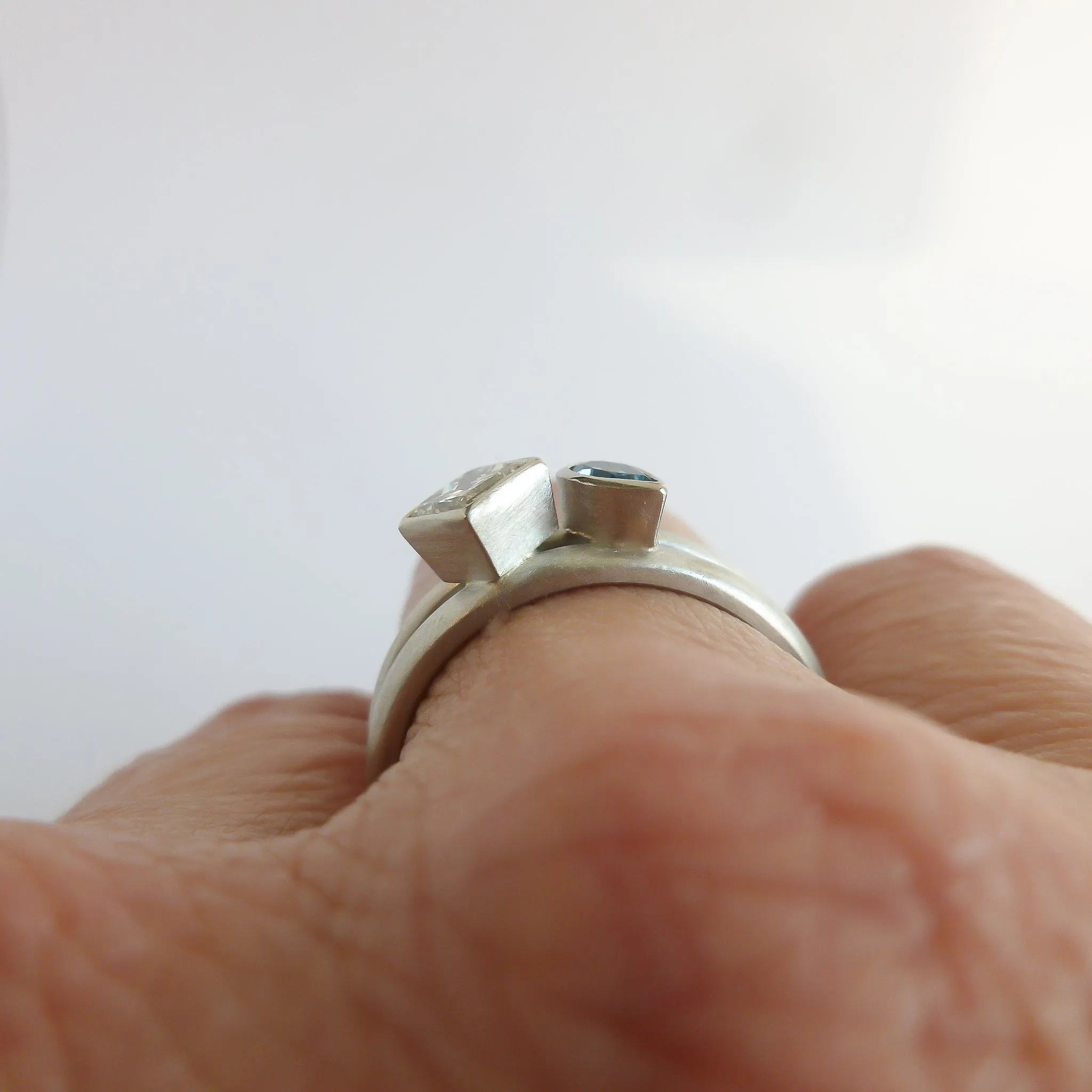 Contemporary diamond and aquamarine platinum dress ring