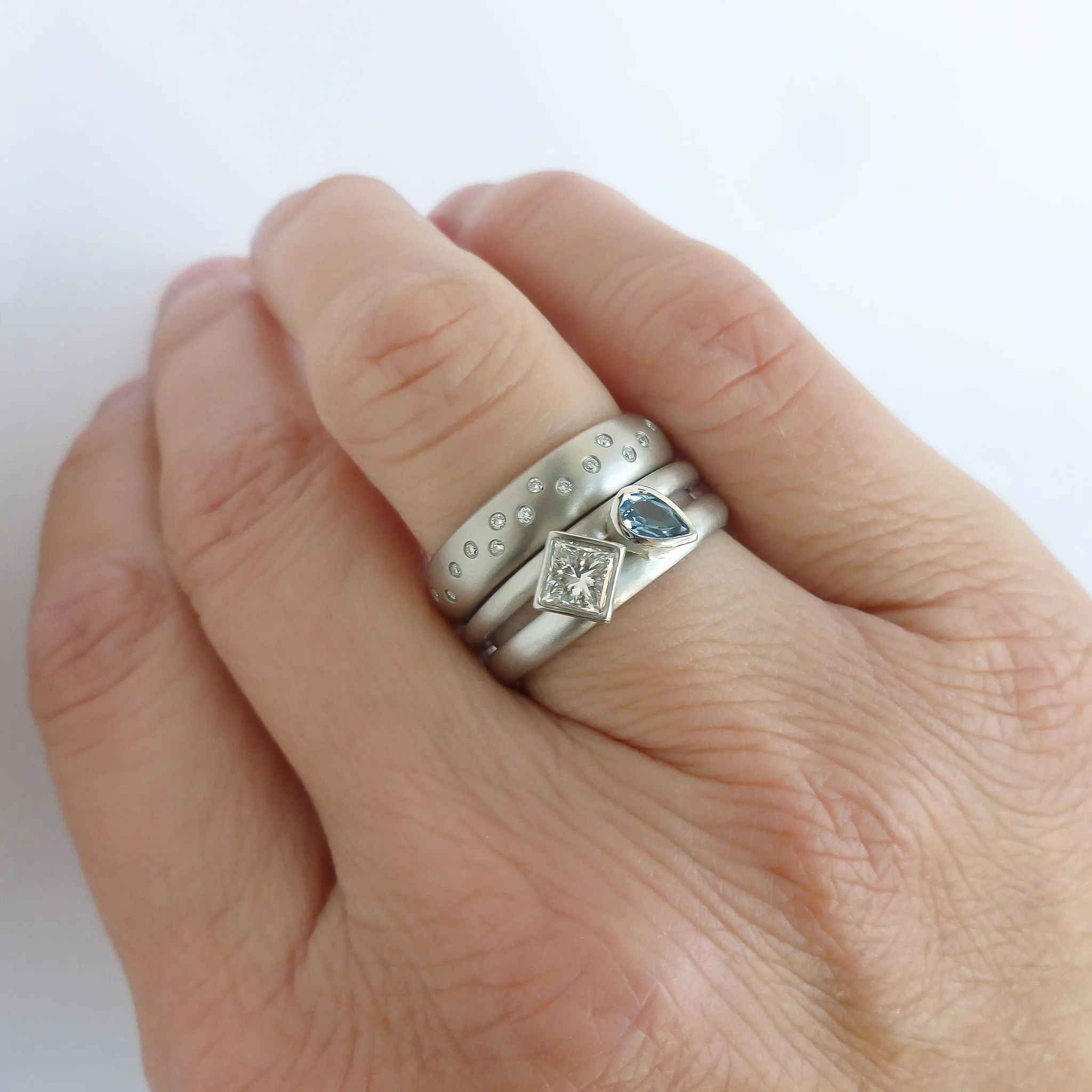 Contemporary diamond and aquamarine platinum dress ring
