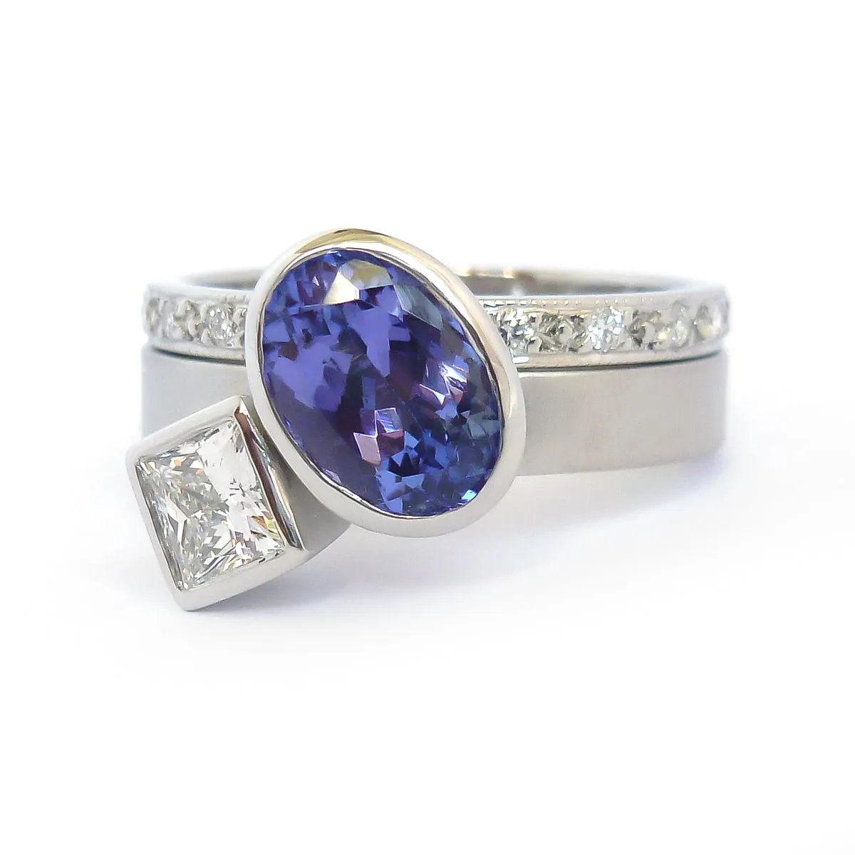 Contemporary platinum and tanzanite two band stacking ring set