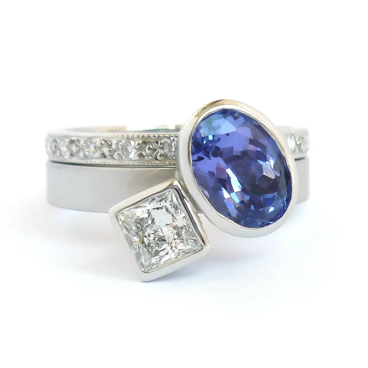 Contemporary platinum and tanzanite two band stacking ring set