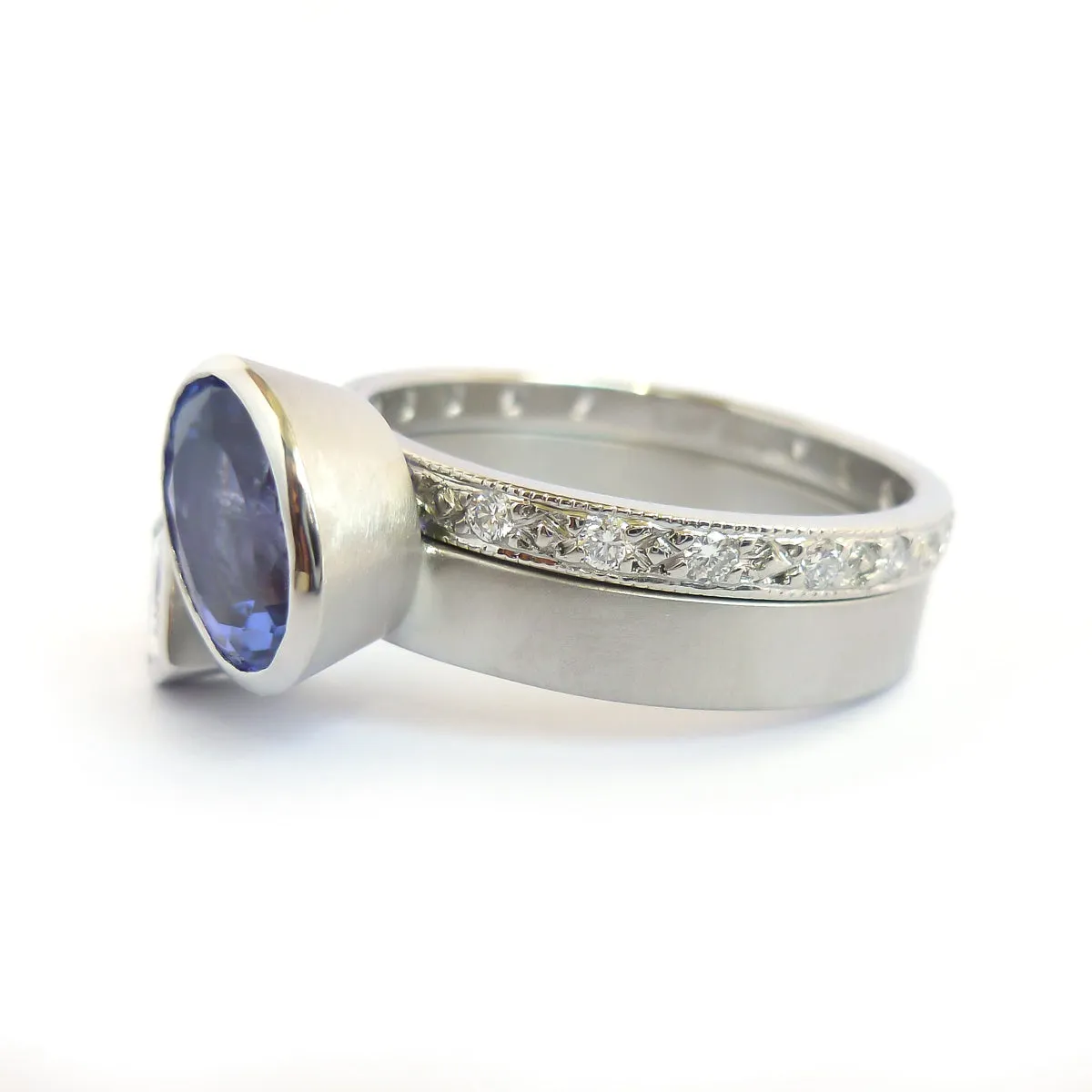 Contemporary platinum and tanzanite two band stacking ring set