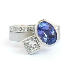 Contemporary platinum and tanzanite two band stacking ring set