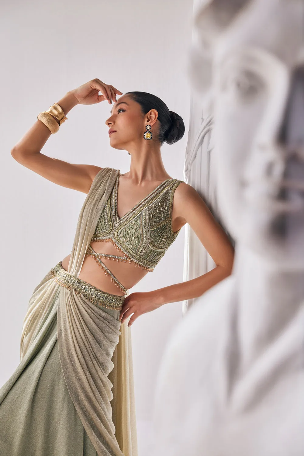 Jade Green Coloured Draped Saree In Lycra And Crinkle Fabric. It Features A Plunging Neck Blouse With Beadwork And Sequin Detailing.