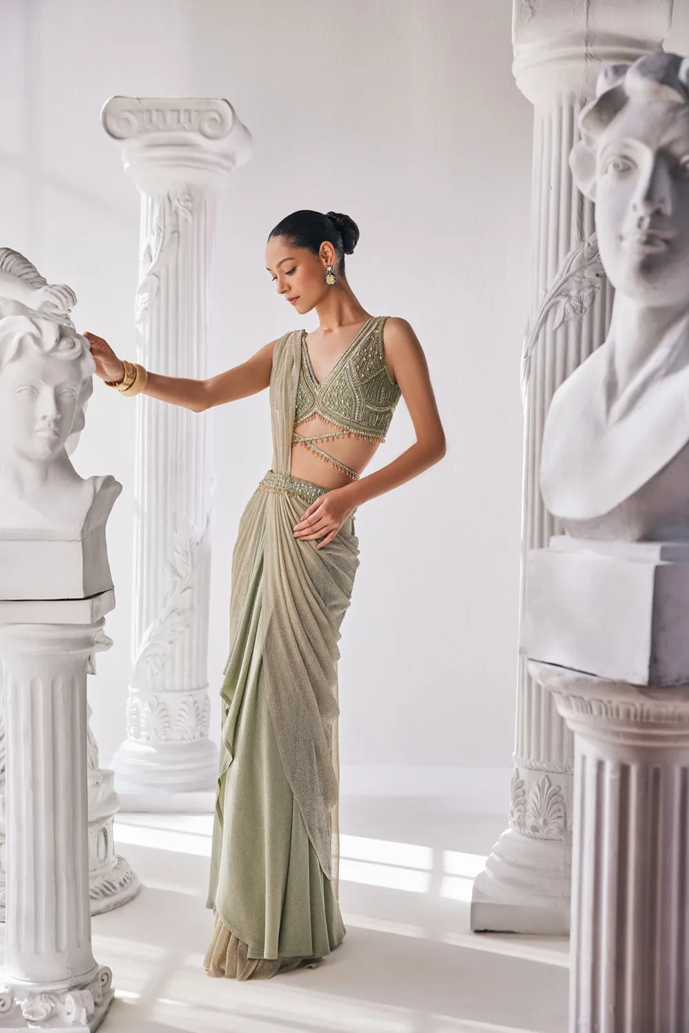 Jade Green Coloured Draped Saree In Lycra And Crinkle Fabric. It Features A Plunging Neck Blouse With Beadwork And Sequin Detailing.