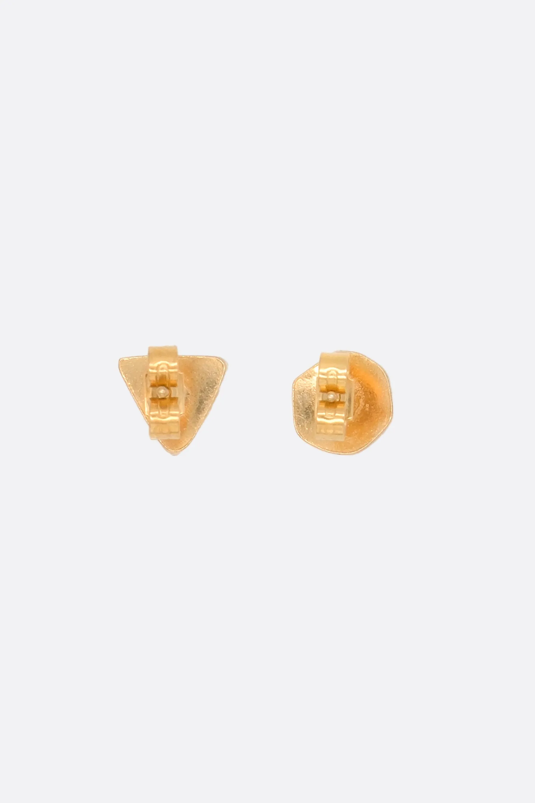 Mismatched stud earrings