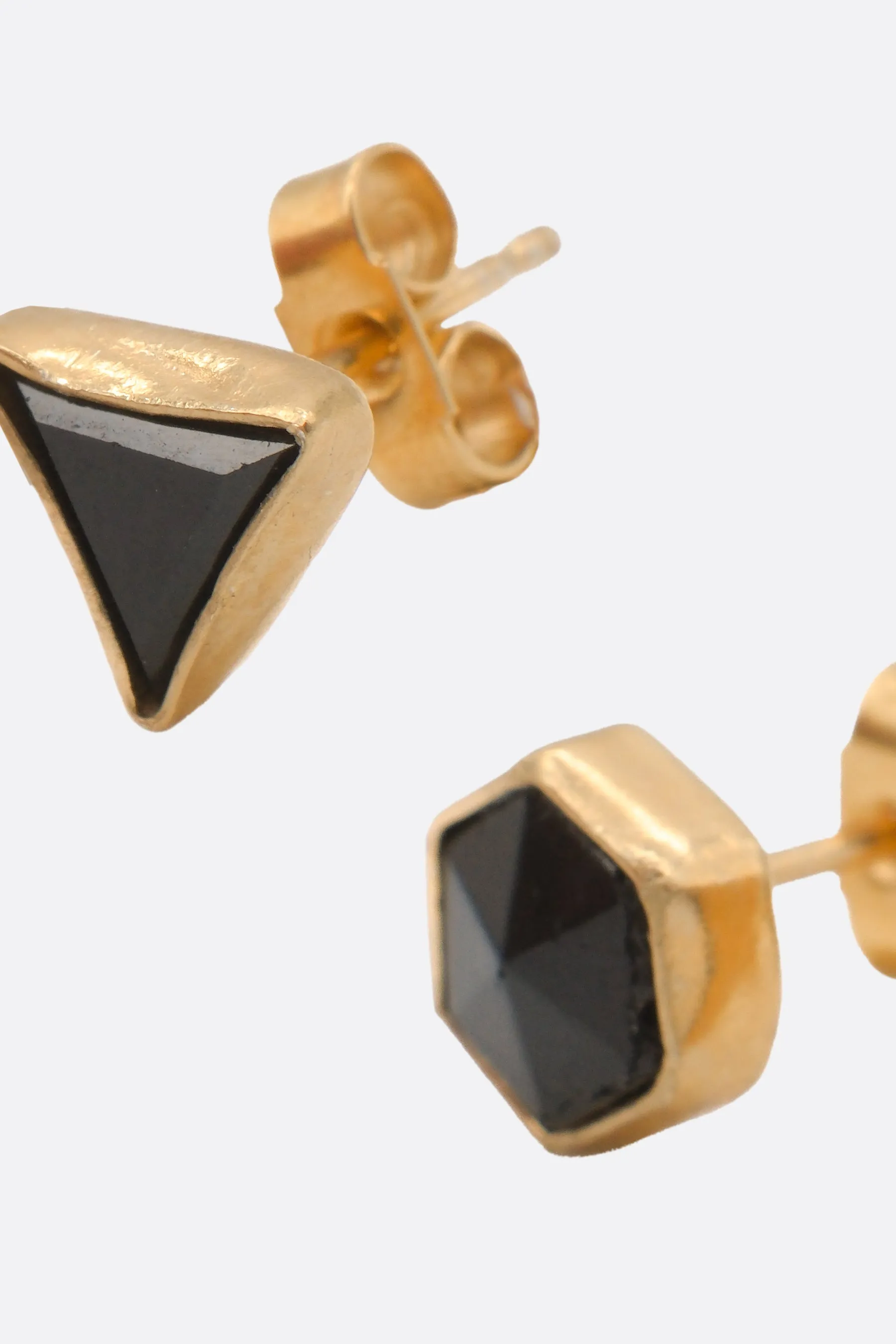 Mismatched stud earrings