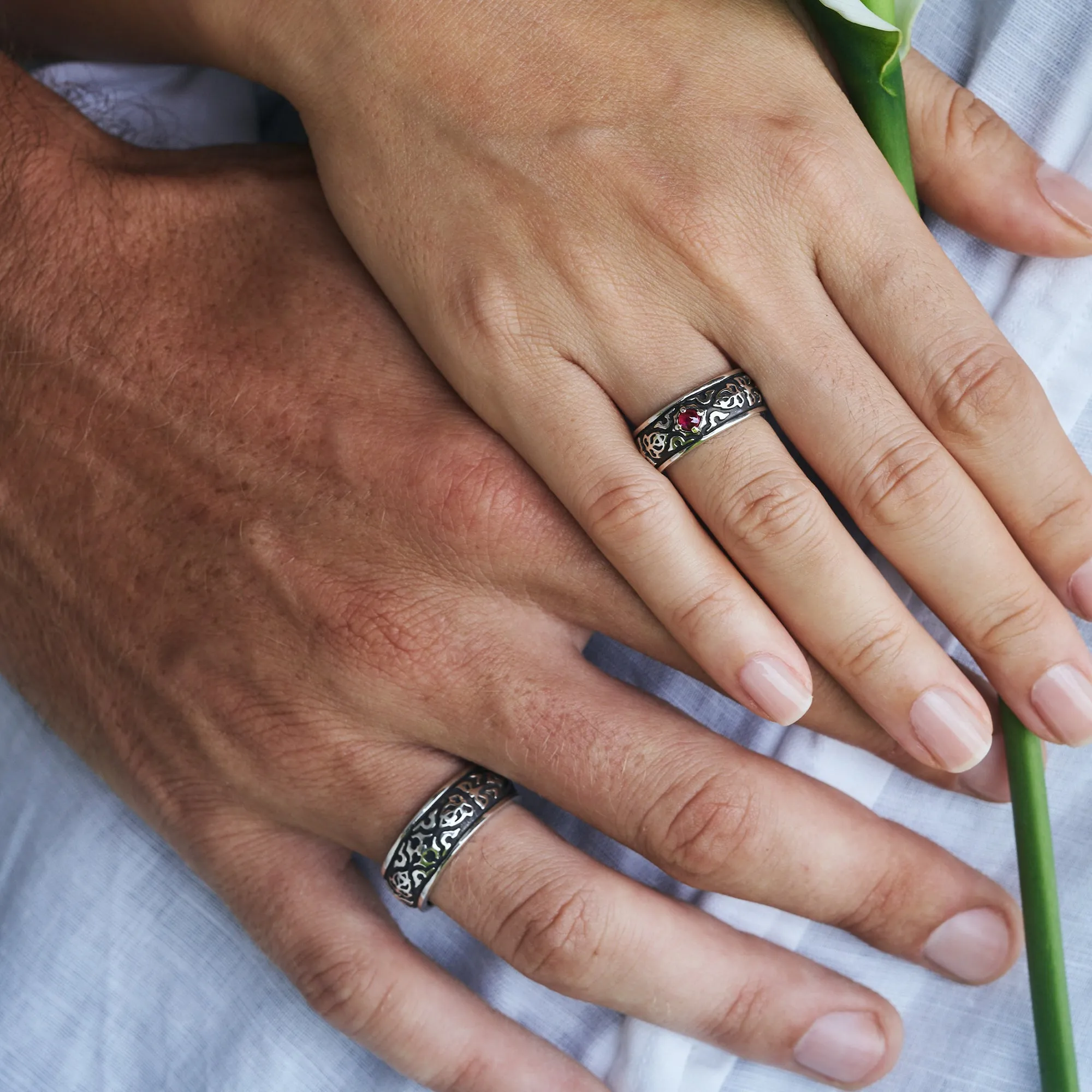 Set of male and female engagement rings with Ruby "Dusk"
