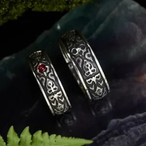 Set of male and female engagement rings with Ruby "Dusk"