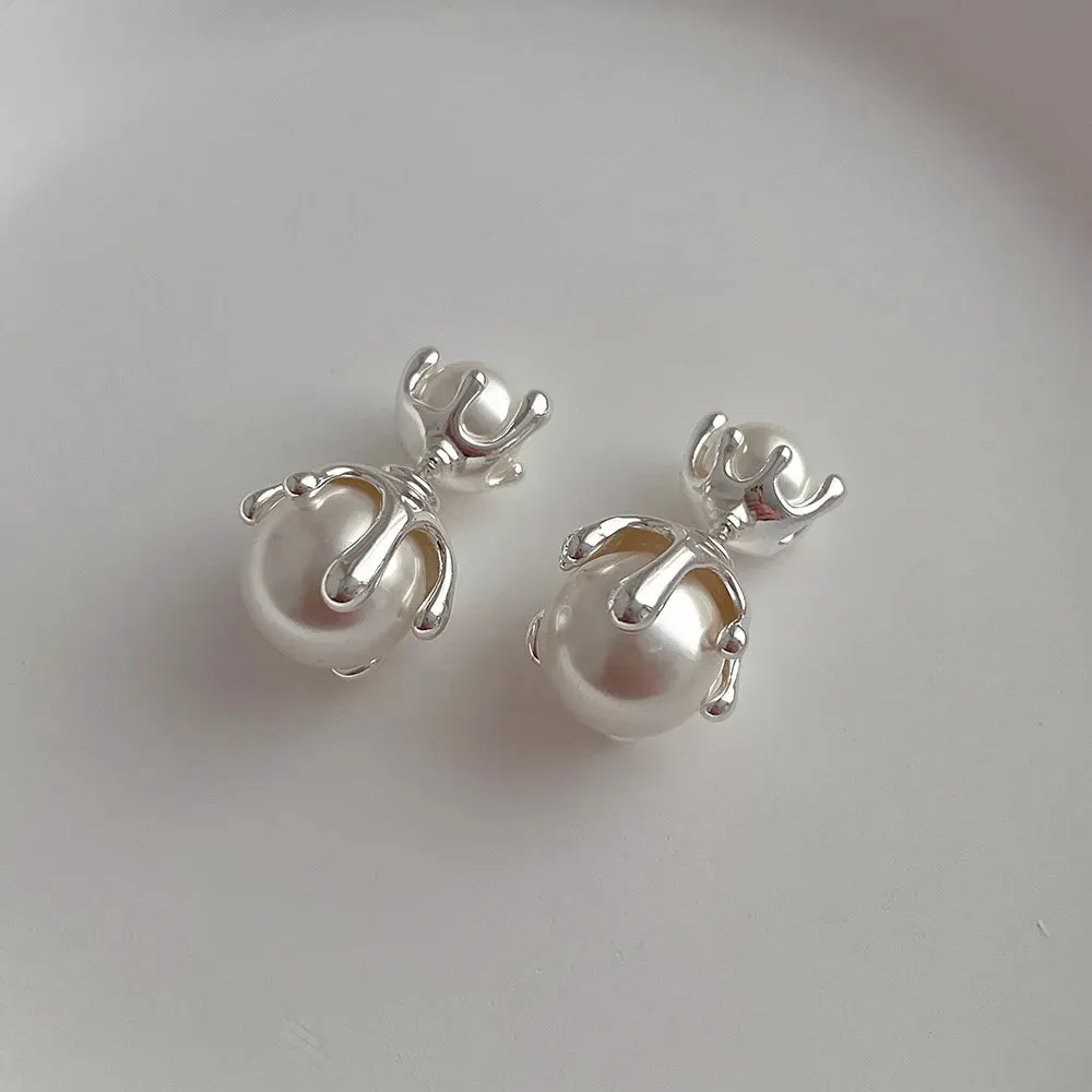 Sleek Edge: Modern Stud Earrings for the Contemporary Soul