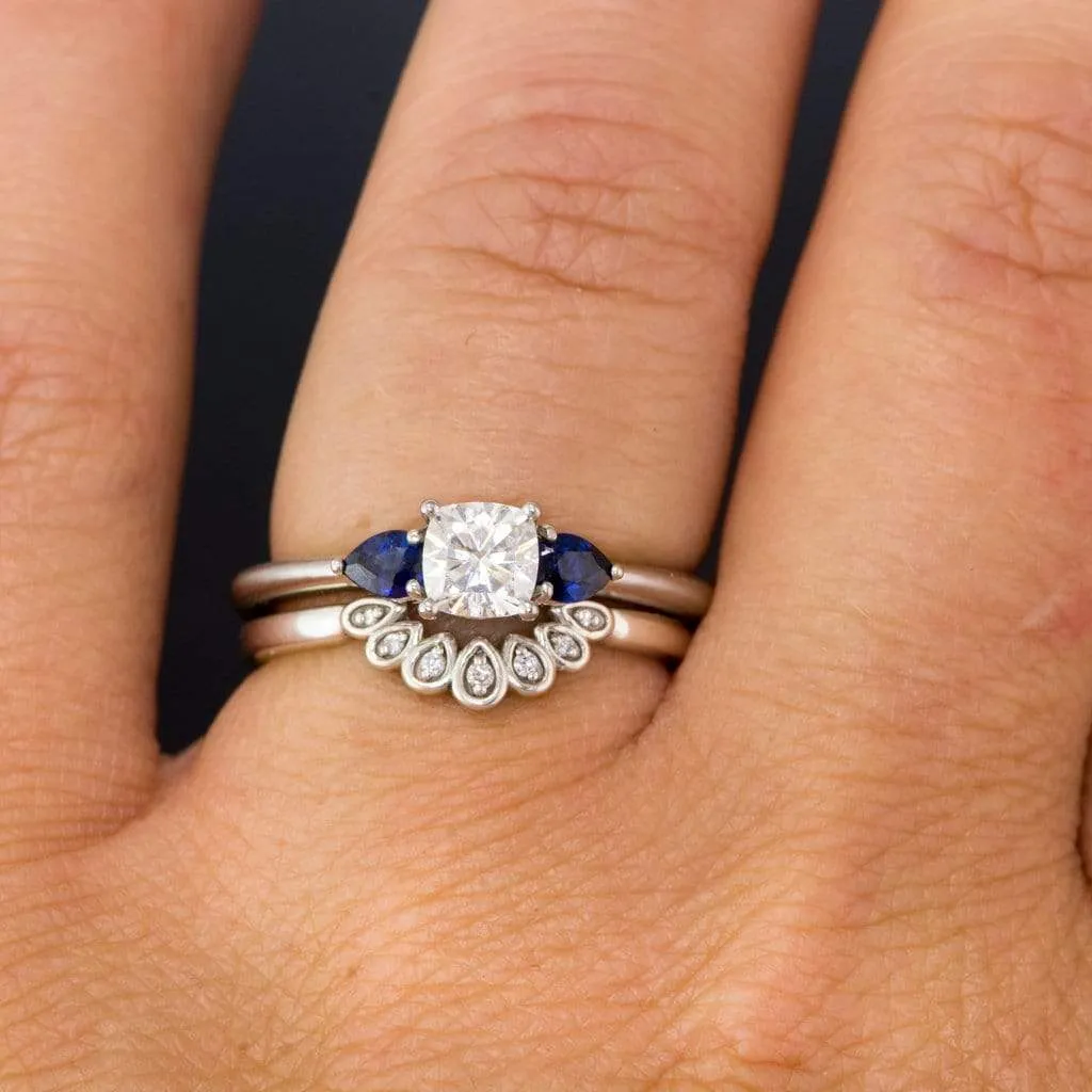 Tressa- Three Stone Engagement Ring, Prong set Cushion Moissanite & Pear Blue Sapphire Accents