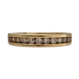 V I N T A G E // hidden LOVE / 10k yellow gold and channel set diamond half eternity band / size 5