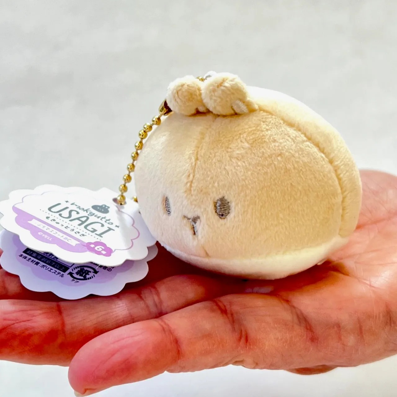 X 63418 ROUND RABBIT PLUSH CHARMS-DISCONTINUED