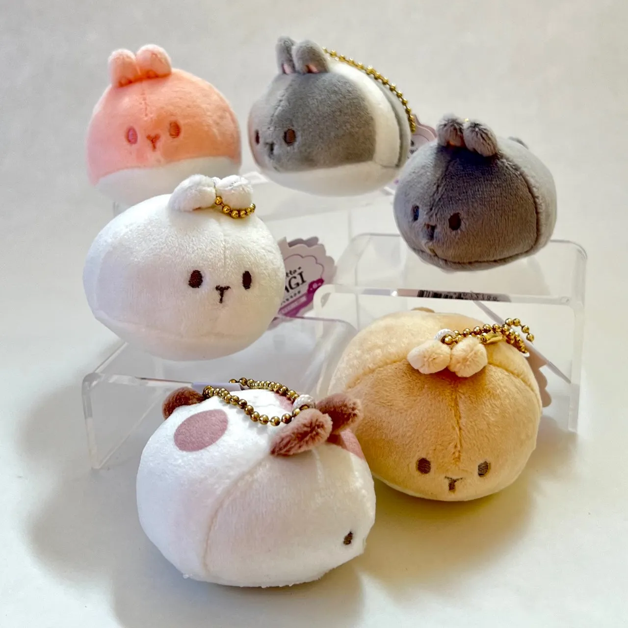 X 63418 ROUND RABBIT PLUSH CHARMS-DISCONTINUED