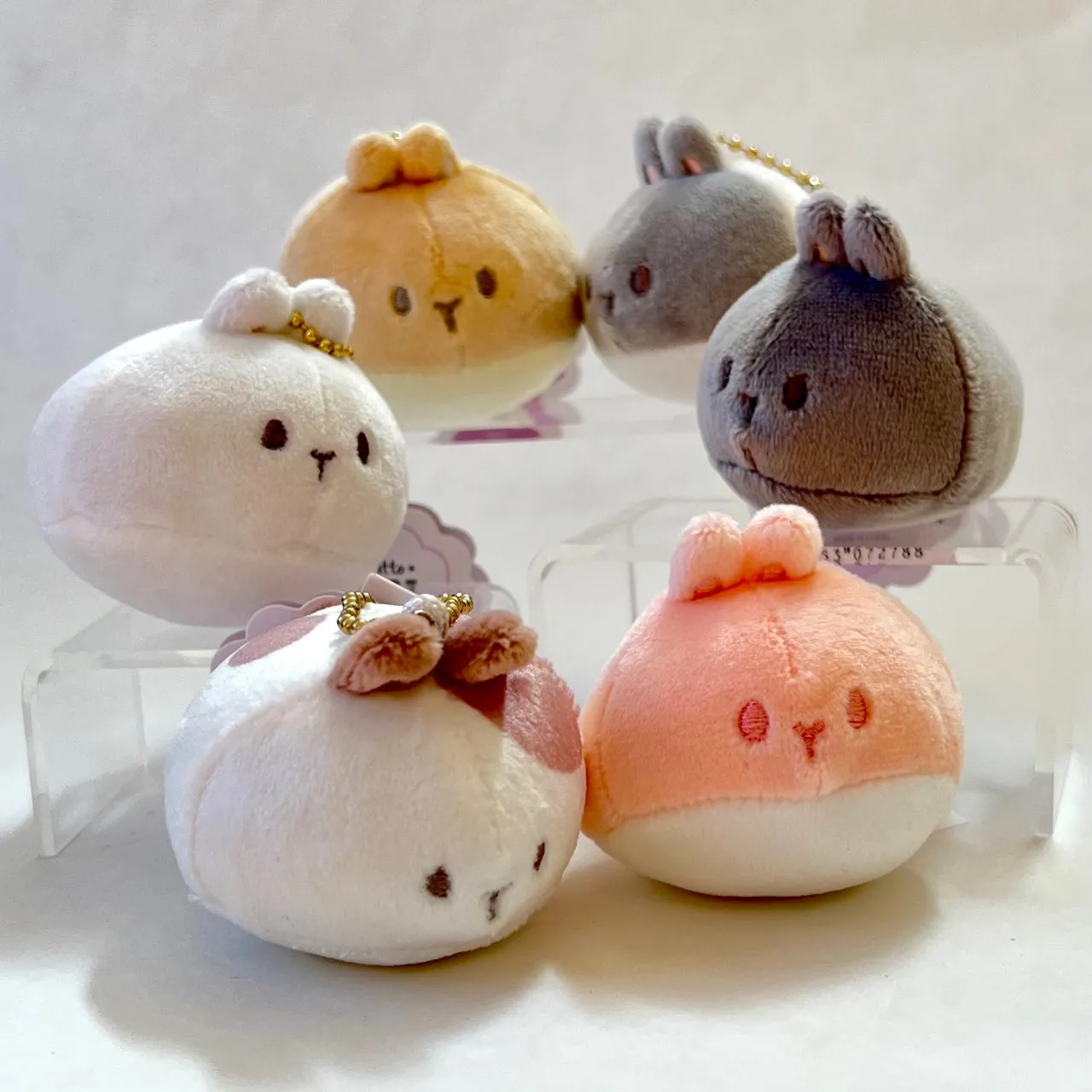 X 63418 ROUND RABBIT PLUSH CHARMS-DISCONTINUED